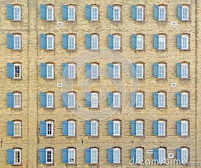 Forty-eight windows on vintage building Stock Photo