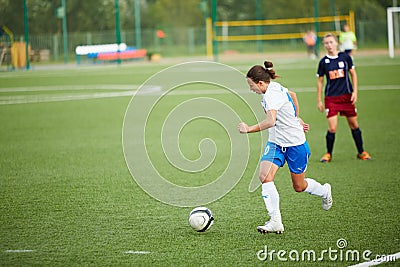 Forward of CSP Izmailovo dribbles ball in game against team Mordovochka Editorial Stock Photo