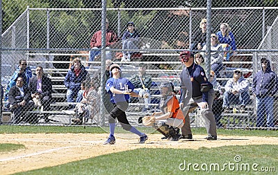 Foul ball at a little league baseball game Editorial Stock Photo