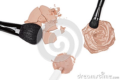 Foundation, concealer and powder with makeup brushes Stock Photo
