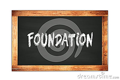 FOUNDATION text written on wooden frame school blackboard Stock Photo
