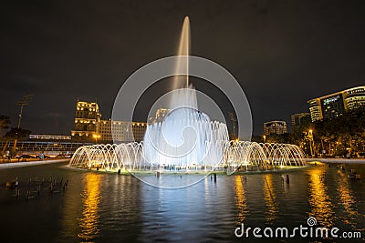 Fountain in Baku National Seaside Park in front of the parliament building by night, Azerbaijan Editorial Stock Photo