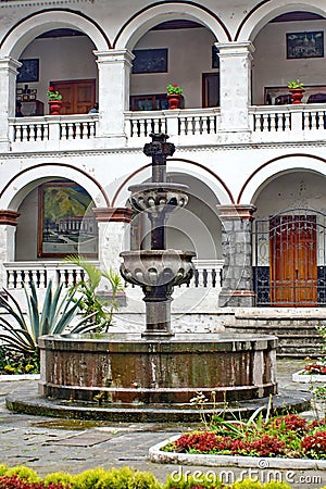 Fountain in a church courtyard Editorial Stock Photo