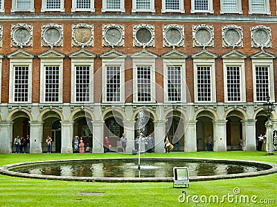 Standing by the Fountain Editorial Stock Photo