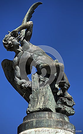 The Fountain of the Fallen Angel (Fuente del Angel Caido) or Monument of the Fallen Angel, a highlight of the Buen Retiro Park in Stock Photo