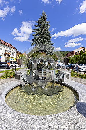 Fountain in the form of poppy heads on the town square, Makow Podhalanski, Poland Editorial Stock Photo
