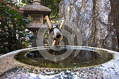Fountain in japanese garden in Monte Carlo Stock Photo