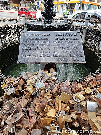 Fountain with locks. Latin America, Uruguay, Montevideo Editorial Stock Photo