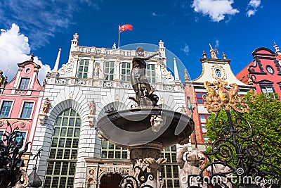 Fountain of the Neptune with face mask in old town of Gdansk, Poland Stock Photo