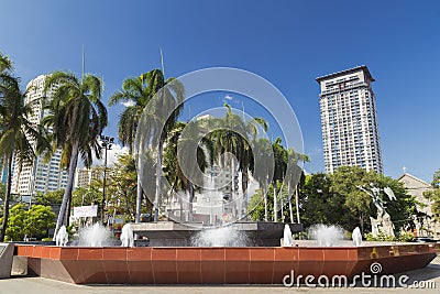 A fountain with palms in Manila, Philippines Editorial Stock Photo