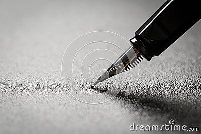 Fountain pen on black background Stock Photo