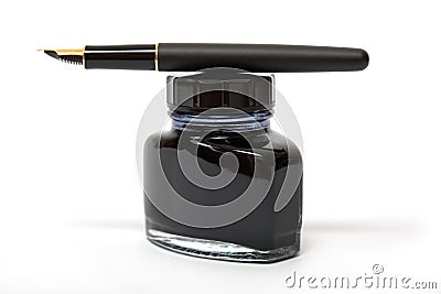 Fountain pen on the ink bottle Stock Photo