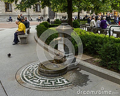 Fountain in Piazza della Scala, a pedestrian square in Milan, Italy. Editorial Stock Photo