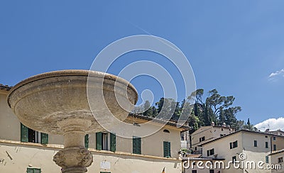The fountain of Piazza Garibaldi square, in the historic center of Cetona, Siena, Italy, on a sunny day Stock Photo