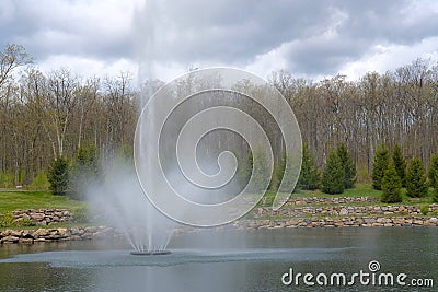 Fountain in Pond Stock Photo