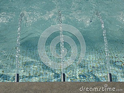 Fountain push sparkling water in a pool Stock Photo