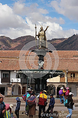 A fountain with a statue of the Inca King Pachacutec in the main square of Cusco, Peru Editorial Stock Photo
