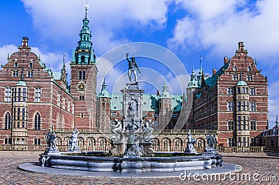 Fountain with statues in front of Frederiksborg Palace, Denmark Stock Photo