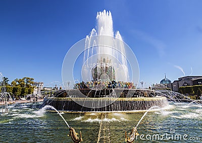 Fountain `Stone flower` on the background of the pavilion `Ukraine` on the territory of the All-Russian exhibition center VDN Editorial Stock Photo