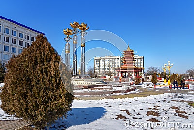 Fountain Three lotus and Pagoda of the Seven Days at central square in spring. Elista. Kalmykia. Russia Editorial Stock Photo
