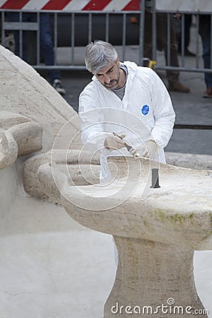 Fountain of the Ugly Boat damaged by Dutch Feyenoord soccer Ultras. Rome, Italy. Editorial Stock Photo