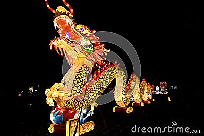 Fountain with an unique light decoration of a chinese dragon. Editorial Stock Photo
