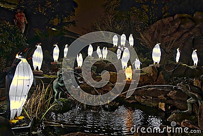 Fountain with an unique light decoration of penguins. Editorial Stock Photo