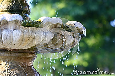 Fountain water dripping Stock Photo