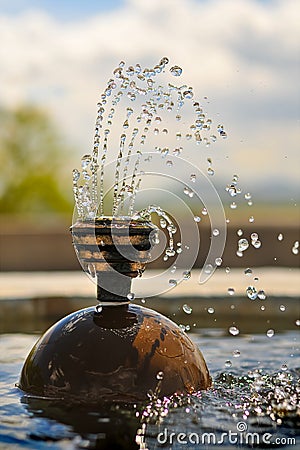 Fountain Water Drops Frozen Flying in Mid Air Stock Photo