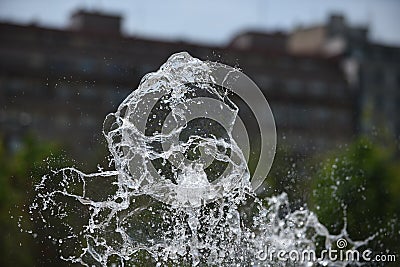 Fountain water frozen in the air Stock Photo