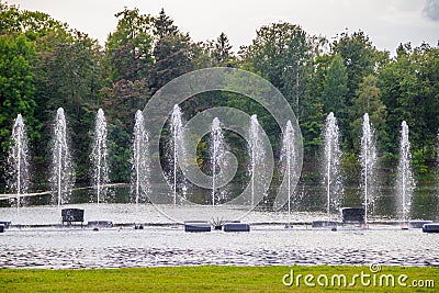 Fountain on the water. Water show. Fountain on the lake in the park Stock Photo