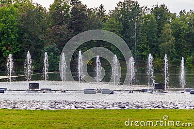 Fountain on the water. Water show. Fountain on the lake in the park Stock Photo