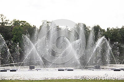 Fountain on the water. Water show. Fountain on the lake in the park Stock Photo