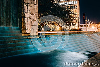 Fountains and buildings at night at Woodruff Park in downtown At Stock Photo