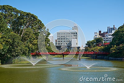 The fountains on the Kawazokoike Pond in Tennoji Park. Osaka. Japan Stock Photo