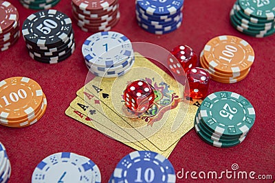 Four of aces near stacks of chips on a red felt table Stock Photo