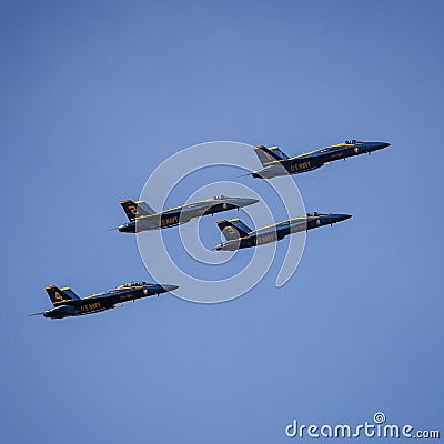 American navy jets flying in formation against a bright blue sky Editorial Stock Photo