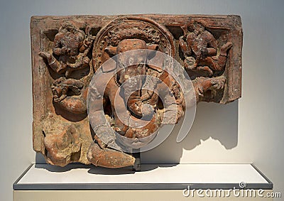 Four-Armed Ganesha terracotta relief on display in the Kimbell Art Museum in Fort Worth, Texas. Editorial Stock Photo