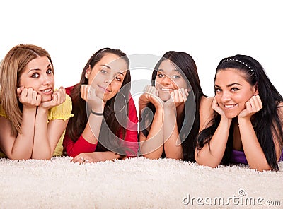 Four beautiful girls on the floor Stock Photo