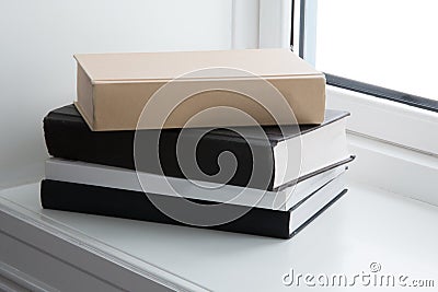 Books windowsill Stock Photo