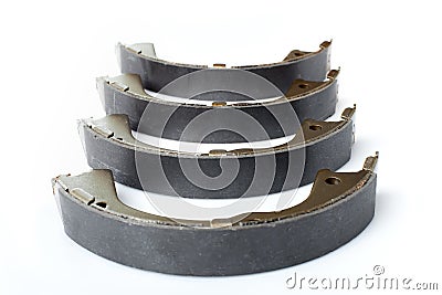 Four brake shoes for drum brakes. Stock Photo