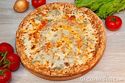 Four cheese pizza on a board. food Stock Photo