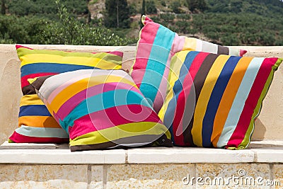 Four colorful striped pillows Stock Photo