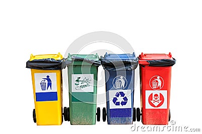 Four colorful trash cans (garbage bins) on white background. Stock Photo