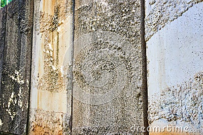 Four concrete wall slabs in varying colors and textures background asset Stock Photo