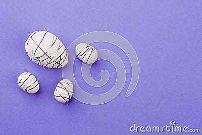 Four decorative Easter eggs and copy space. Stock Photo