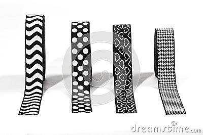 Four different black and white elastic ribbons Stock Photo