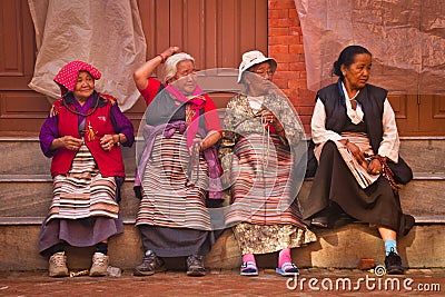 Four elderly Tibetans of Boudhanath Temple, Kathmandu, Nepal Editorial Stock Photo
