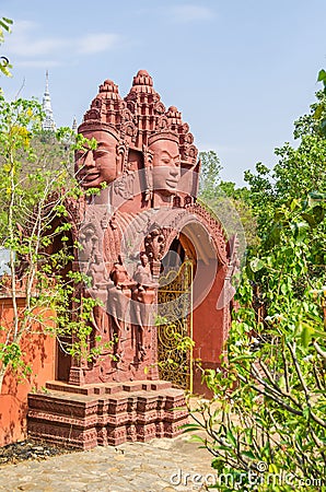 Four-faced gopura in the Vipassana Dhura Buddhist Meditation Center in Cambodia Editorial Stock Photo