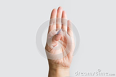 four fingers and folding over the thumb Stock Photo